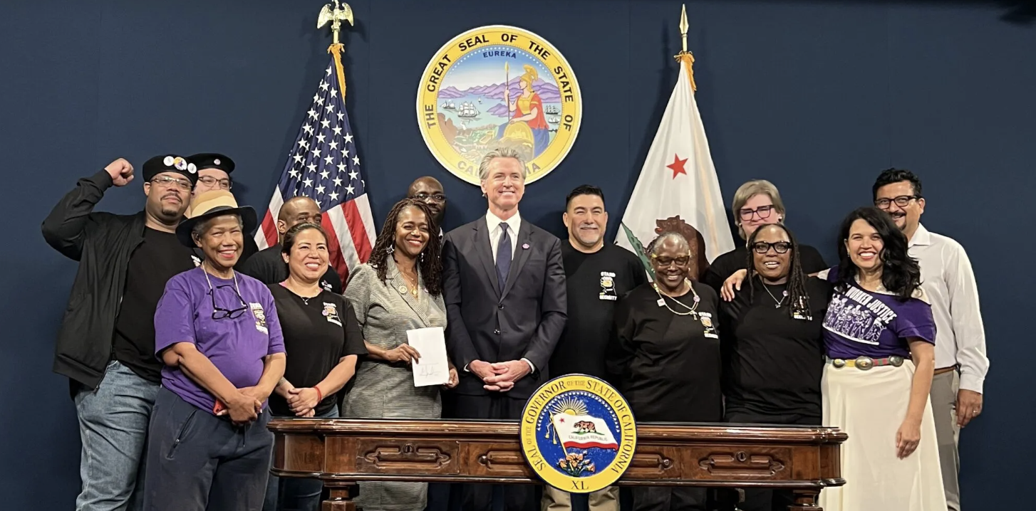 Gov. Newsom Signs Stand for Security Act grouop picture